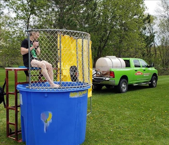 Servpro truck in front of dunk tank