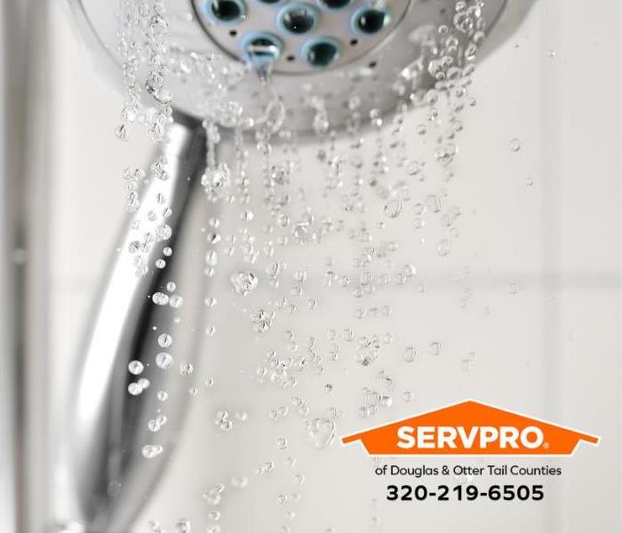 A dripping showerhead is shown.
