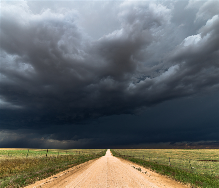 Storm brewing on a dirt road